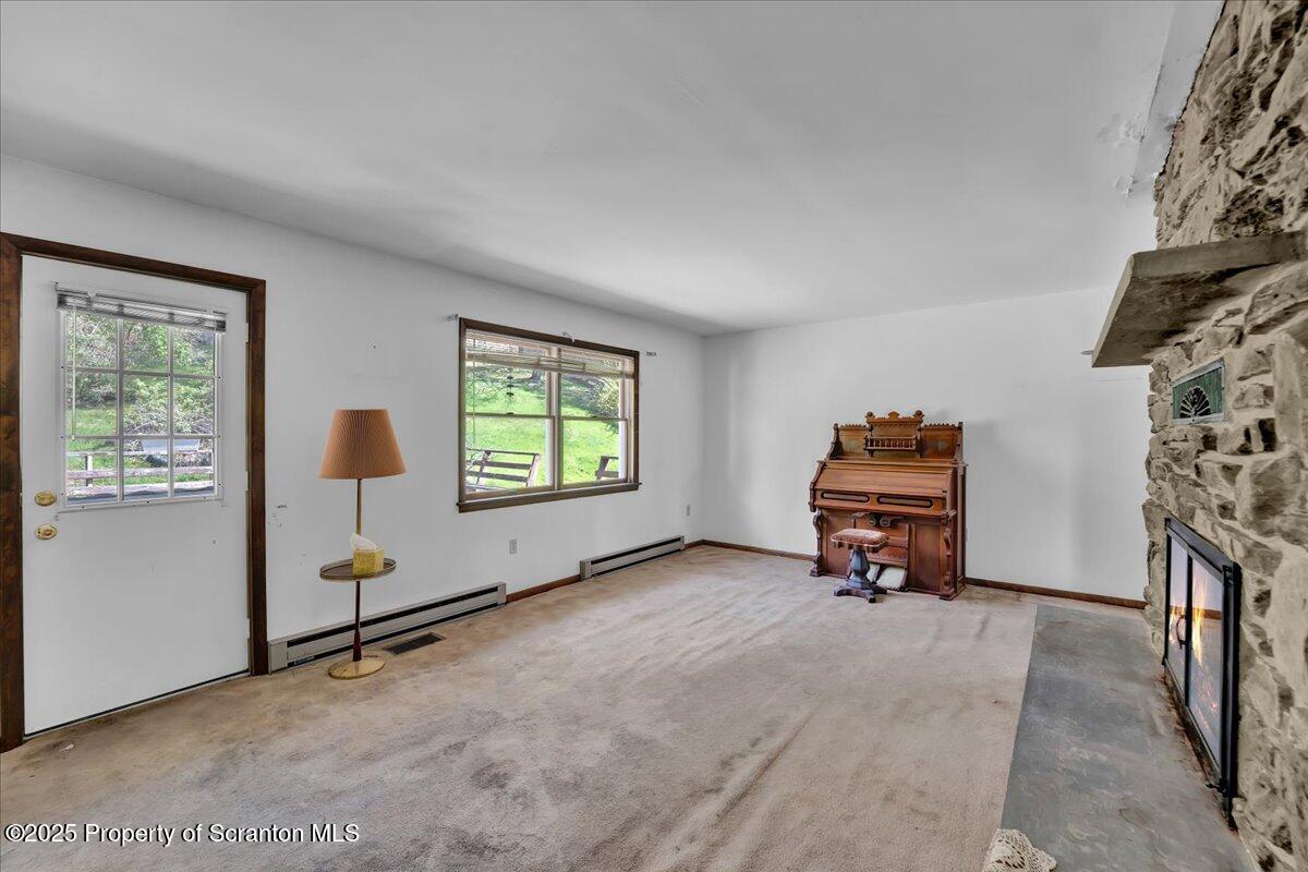 906 Violet Terrace Clarks Summit, PA 18411 - Photo 6 of 38 an empty room with windows and closet