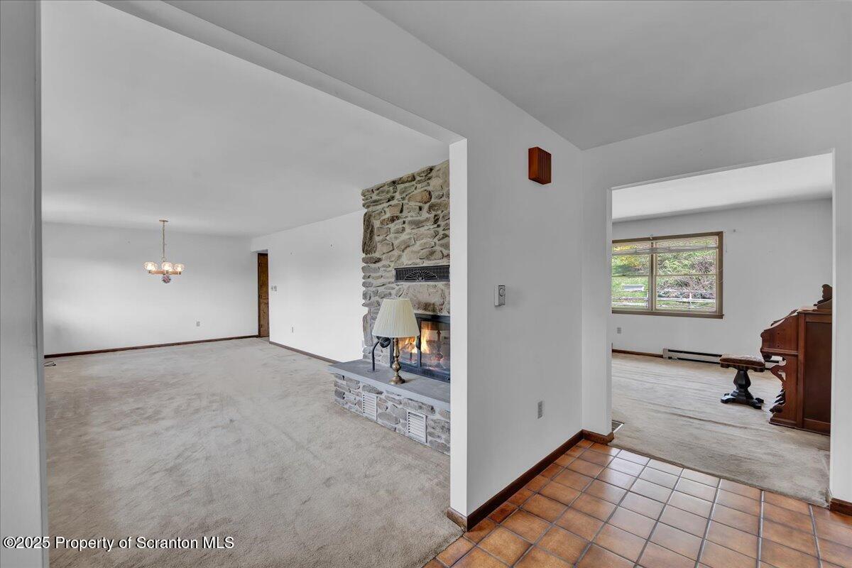 906 Violet Terrace Clarks Summit, PA 18411 - Photo 10 of 38 a view of a livingroom with a workspace