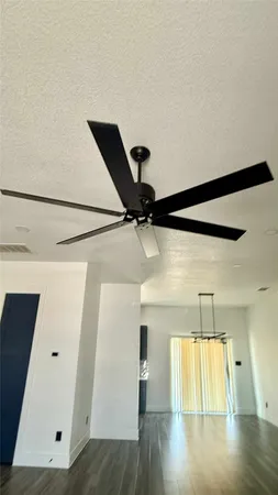 a living room with wooden floor