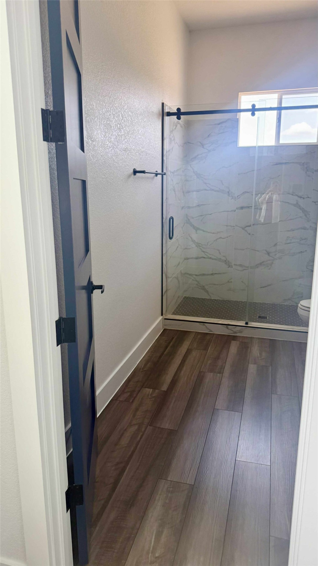 146 Buena Fortuna Road Elgin, TX 78621 - Photo 7 of 15 a view of a room with wooden floor