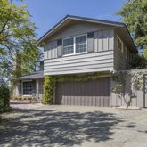 a front view of a house with a garage