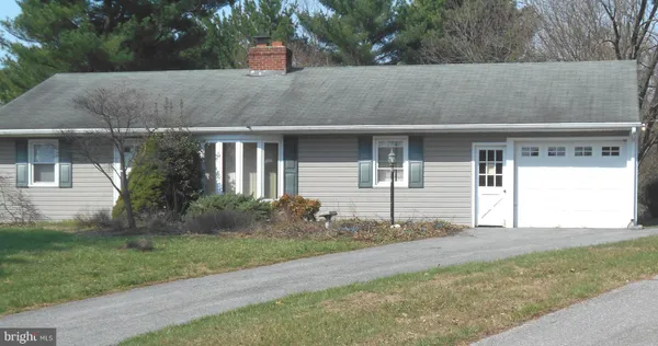 front view of house with a yard