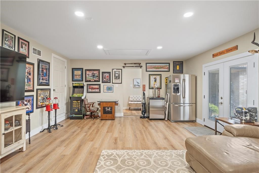 311 Blue Water Drive Portland, TX 78374 - Photo 20 of 25 a living room with furniture and a flat screen tv