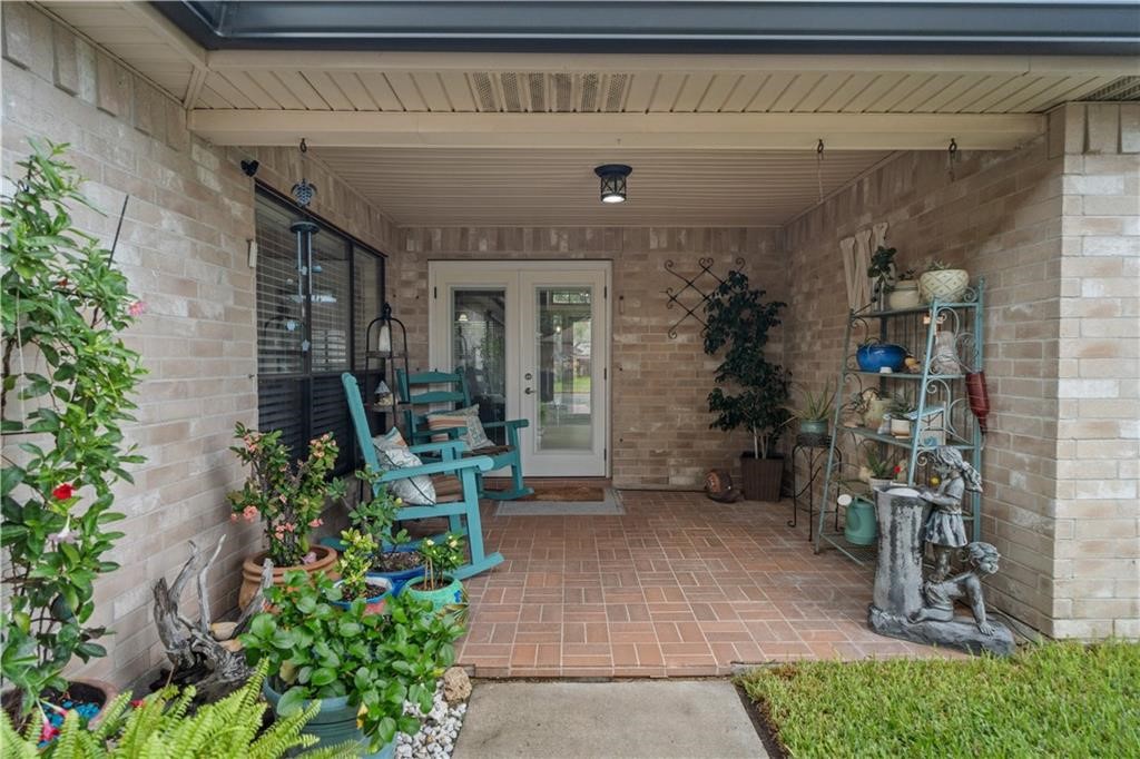 311 Blue Water Drive Portland, TX 78374 - Photo 22 of 25 a front view of a house with plants