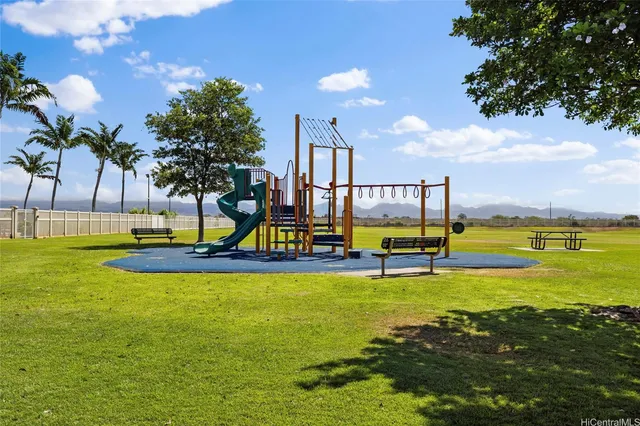a view of a swimming pool with an ocean view
