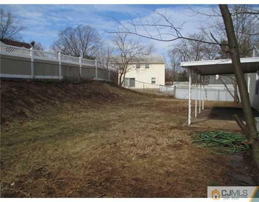 12 Indiana Road Somerset, NJ 08873 - Photo 12 of 12 a backyard of a house with lots of green space