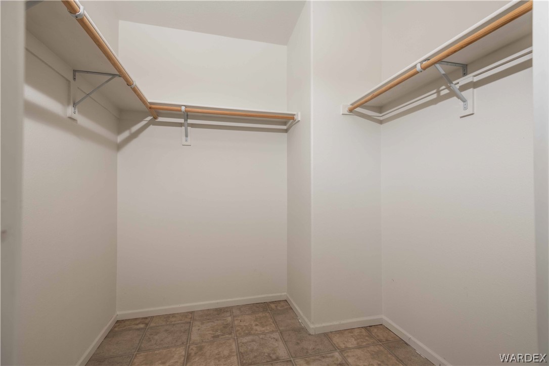 4229 Cove Road Golden Valley, AZ 86413 - Photo 15 of 36 a view of walk in closet