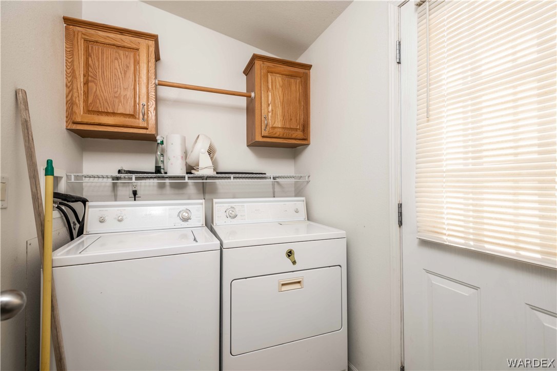 4229 Cove Road Golden Valley, AZ 86413 - Photo 26 of 36 a utility room with dryer and washer