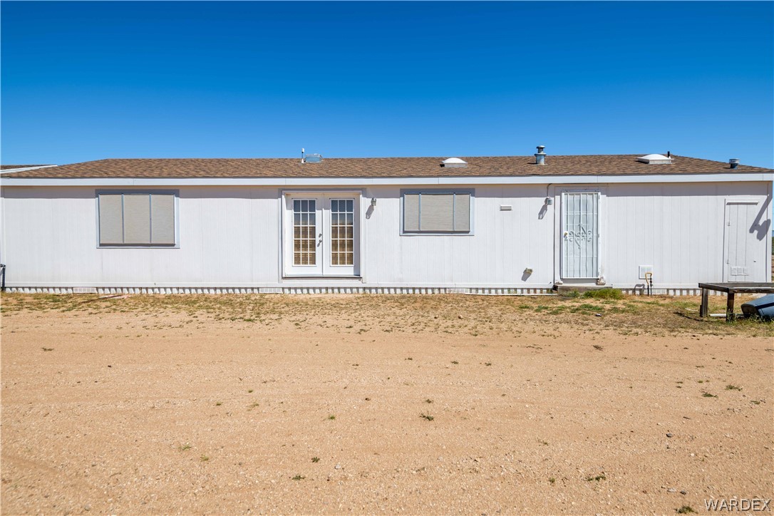 4229 Cove Road Golden Valley, AZ 86413 - Photo 32 of 36 a view of a house with backyard