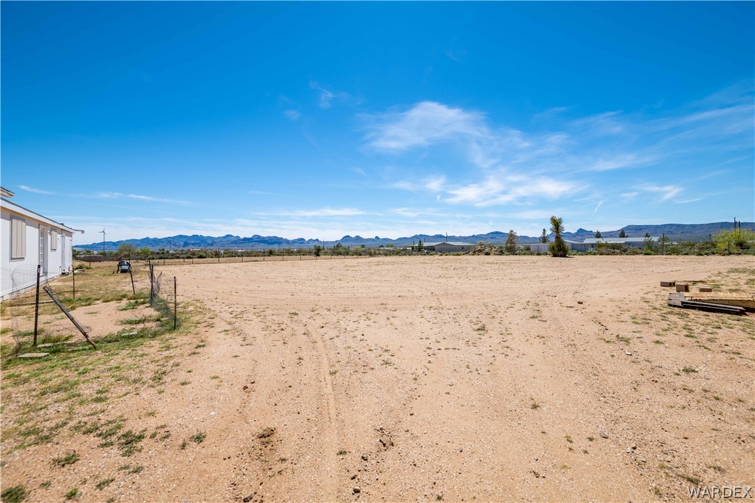 4229 Cove Road Golden Valley, AZ 86413 - Photo 34 of 36 a view of a lake with beach and city view