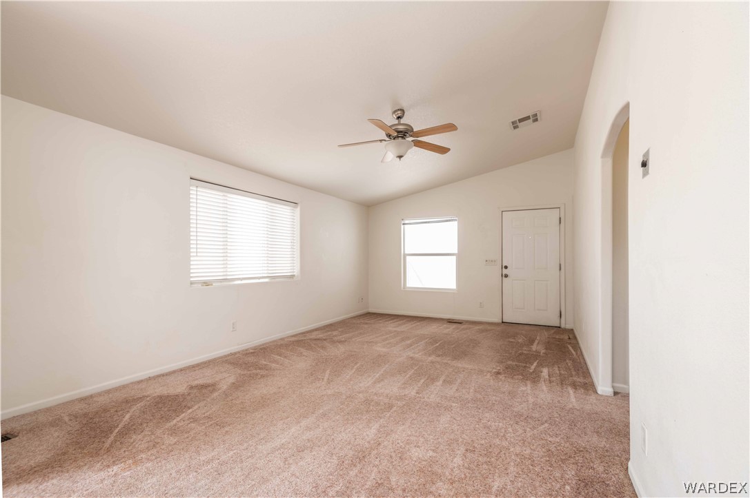 4229 Cove Road Golden Valley, AZ 86413 - Photo 10 of 36 a view of an empty room with a window
