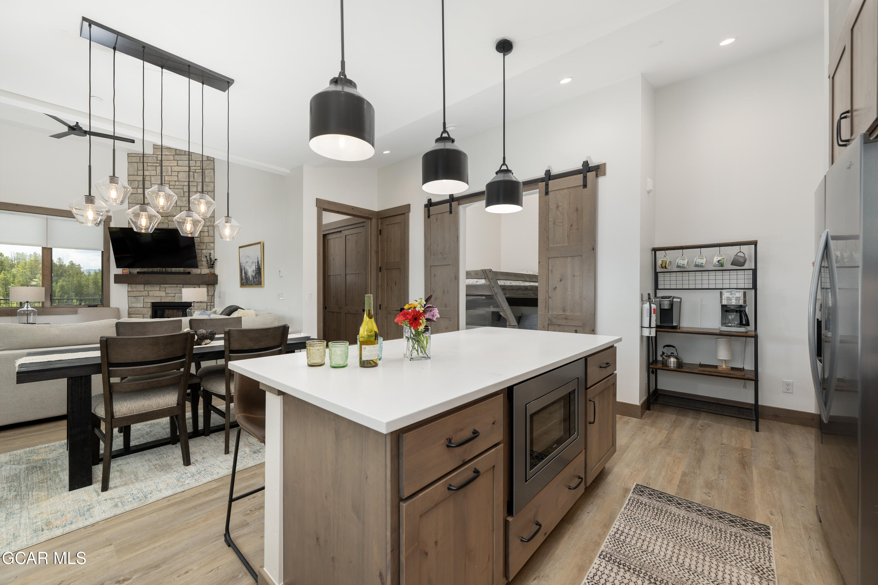 96 Meadow Trail, Unit G304 Fraser, CO 80442 - Photo 11 of 37 a kitchen with a sink appliances and a counter top space