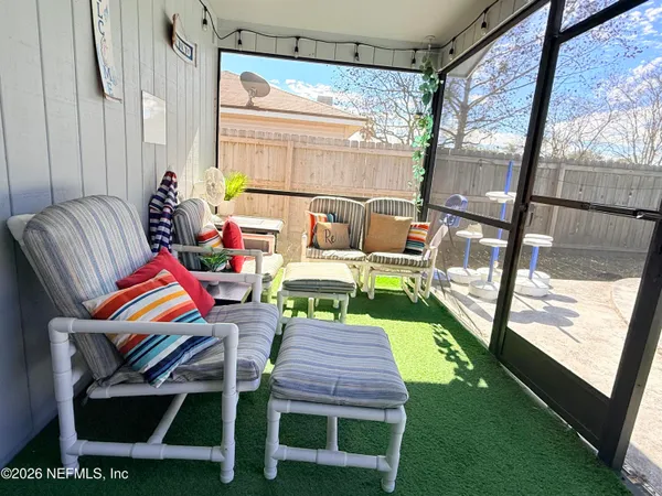 a view of a swimming pool with a yard