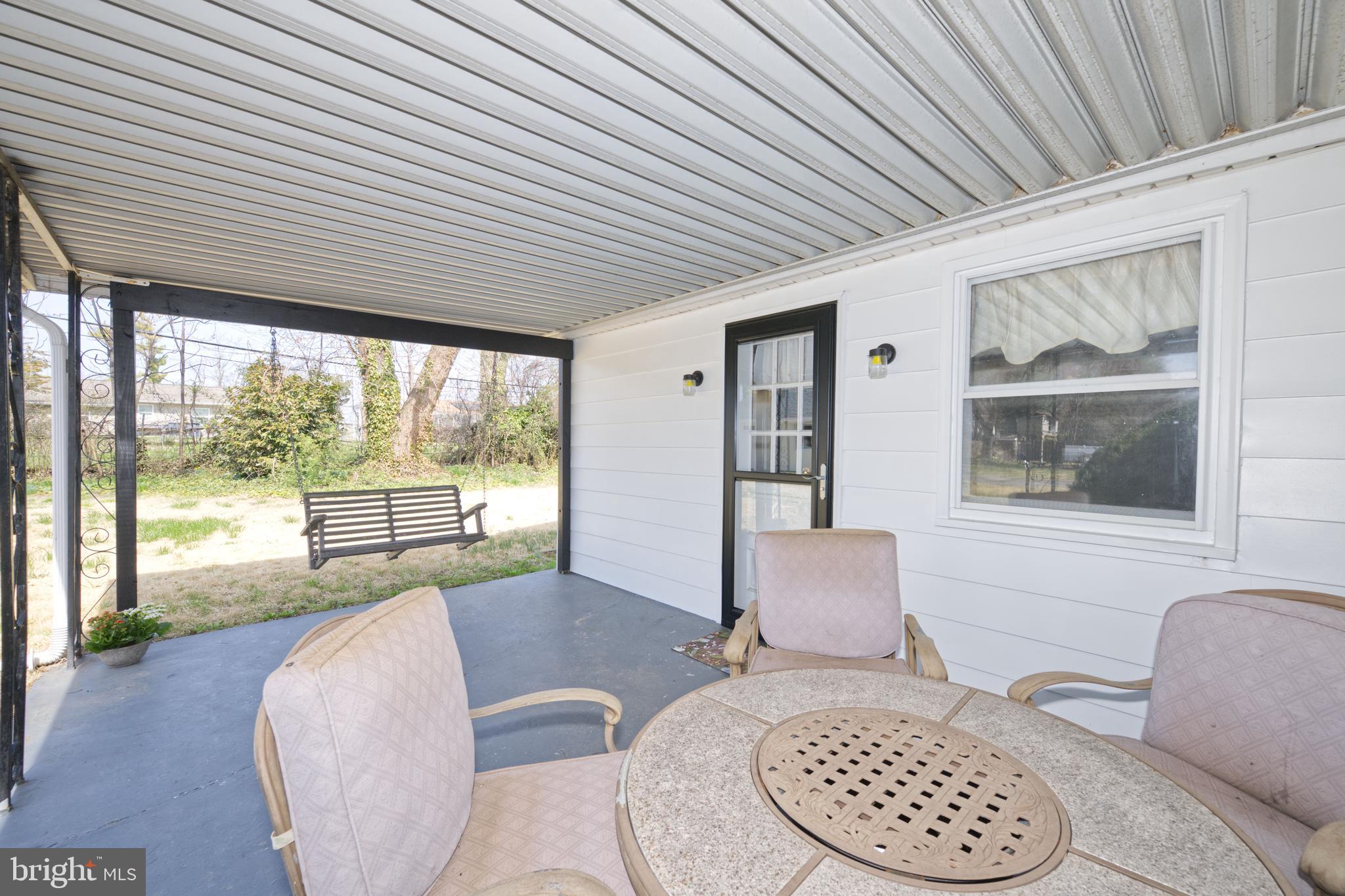 89 Cooper Road Dover, DE 19901 - Photo 28 of 32 a living room with furniture and a large window