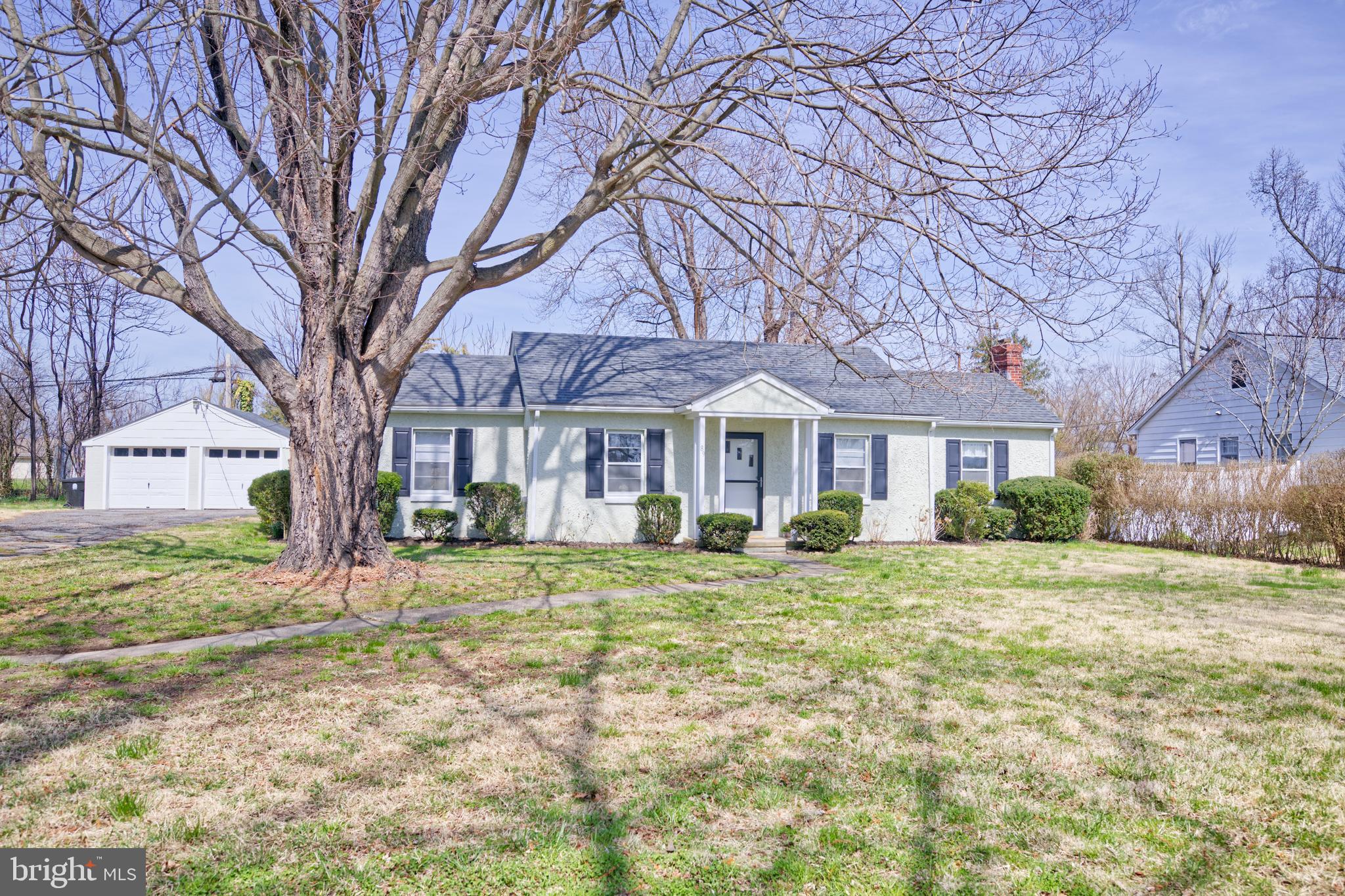 89 Cooper Road Dover, DE 19901 - Photo 3 of 32 a front view of a house with a yard