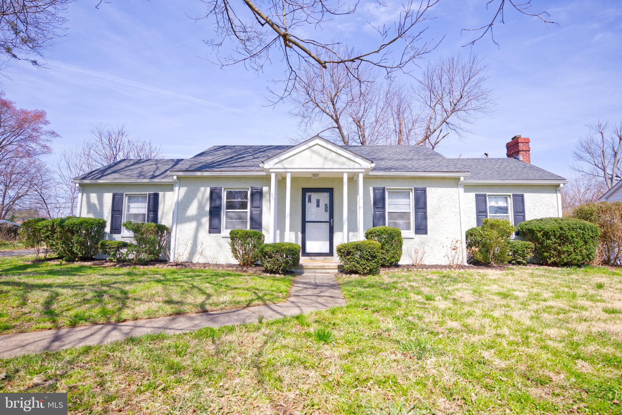 89 Cooper Road Dover, DE 19901 - Photo 4 of 32 a front view of a house with a yard
