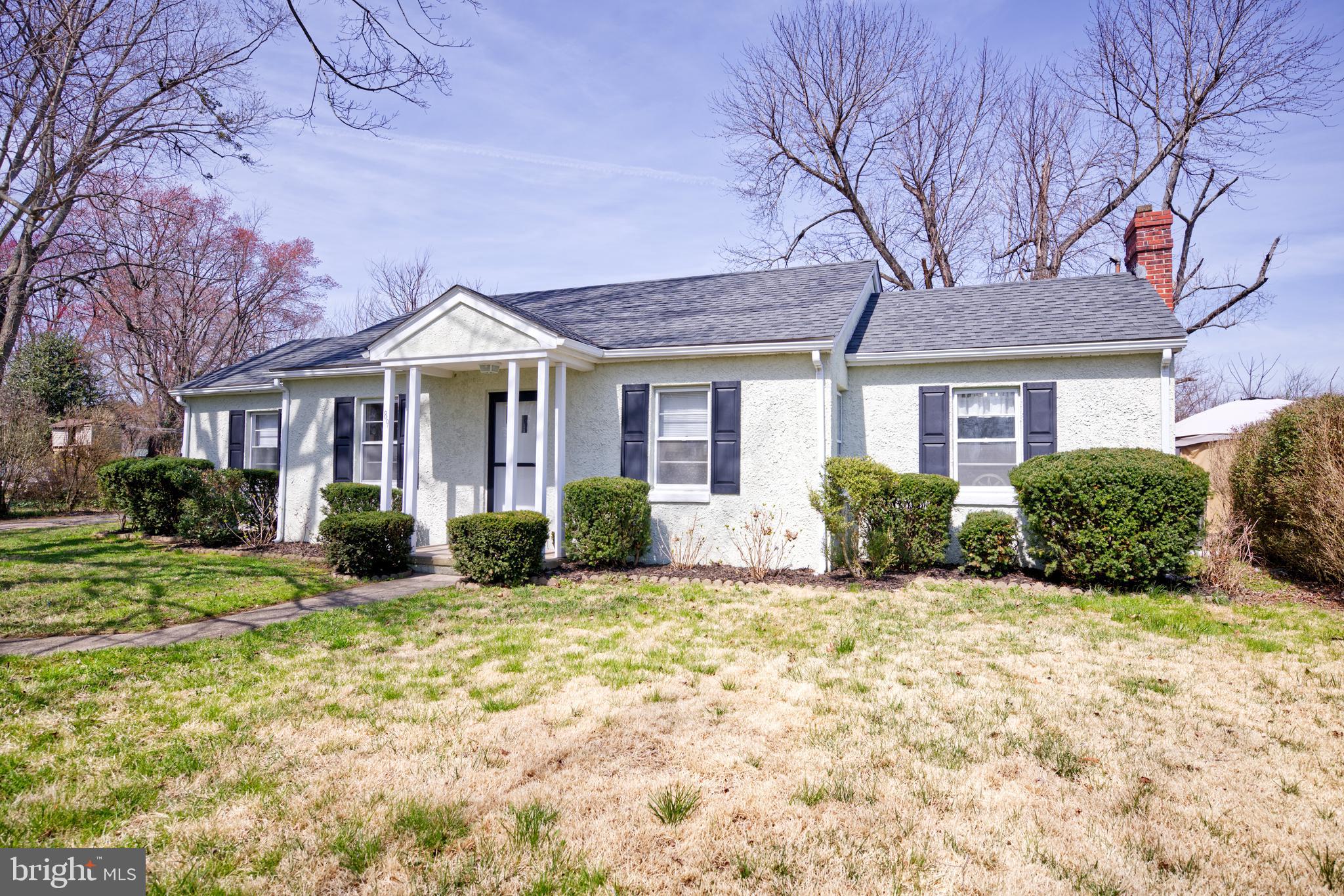 89 Cooper Road Dover, DE 19901 - Photo 5 of 32 a view of a house with a big yard and large trees