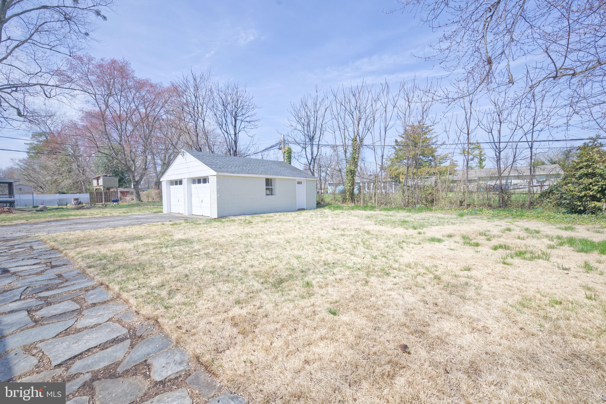 89 Cooper Road Dover, DE 19901 - Photo 10 of 32 a view of white house with a yard