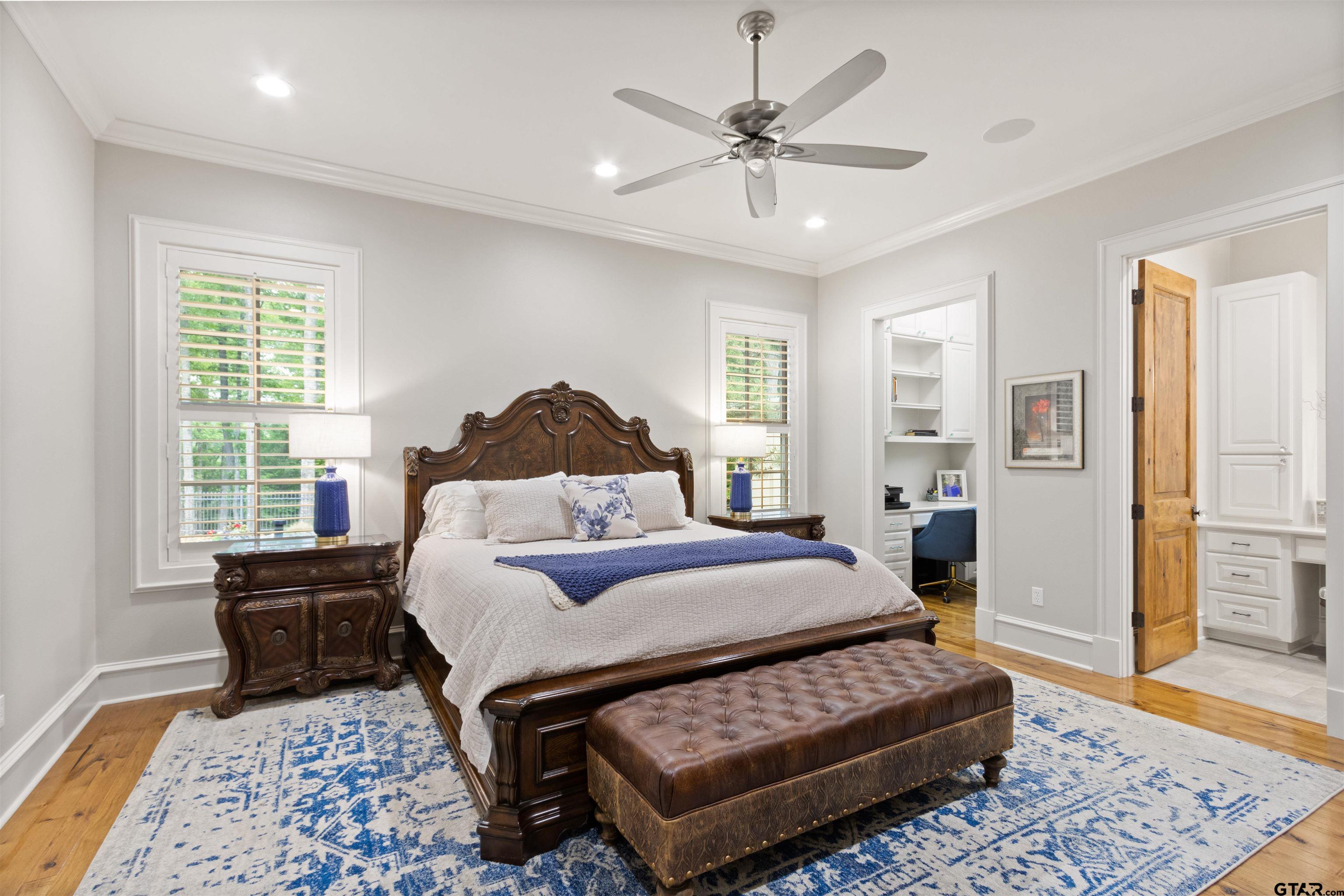 1506 Hamby Road Longview, TX 75605 - Photo 18 of 48 a bedroom with a bed a couch and dresser