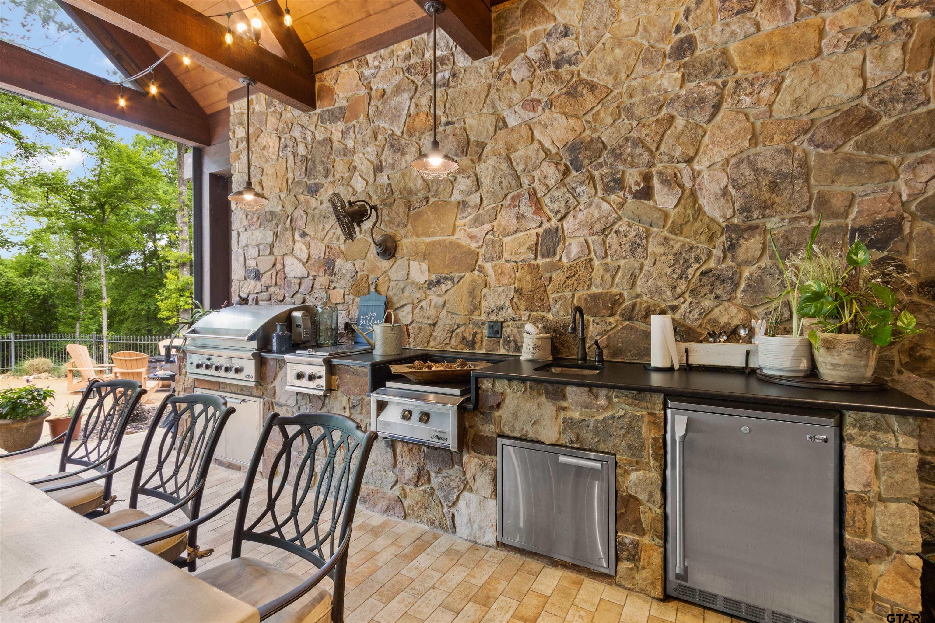 1506 Hamby Road Longview, TX 75605 - Photo 25 of 48 a view of a chairs and table in the patio