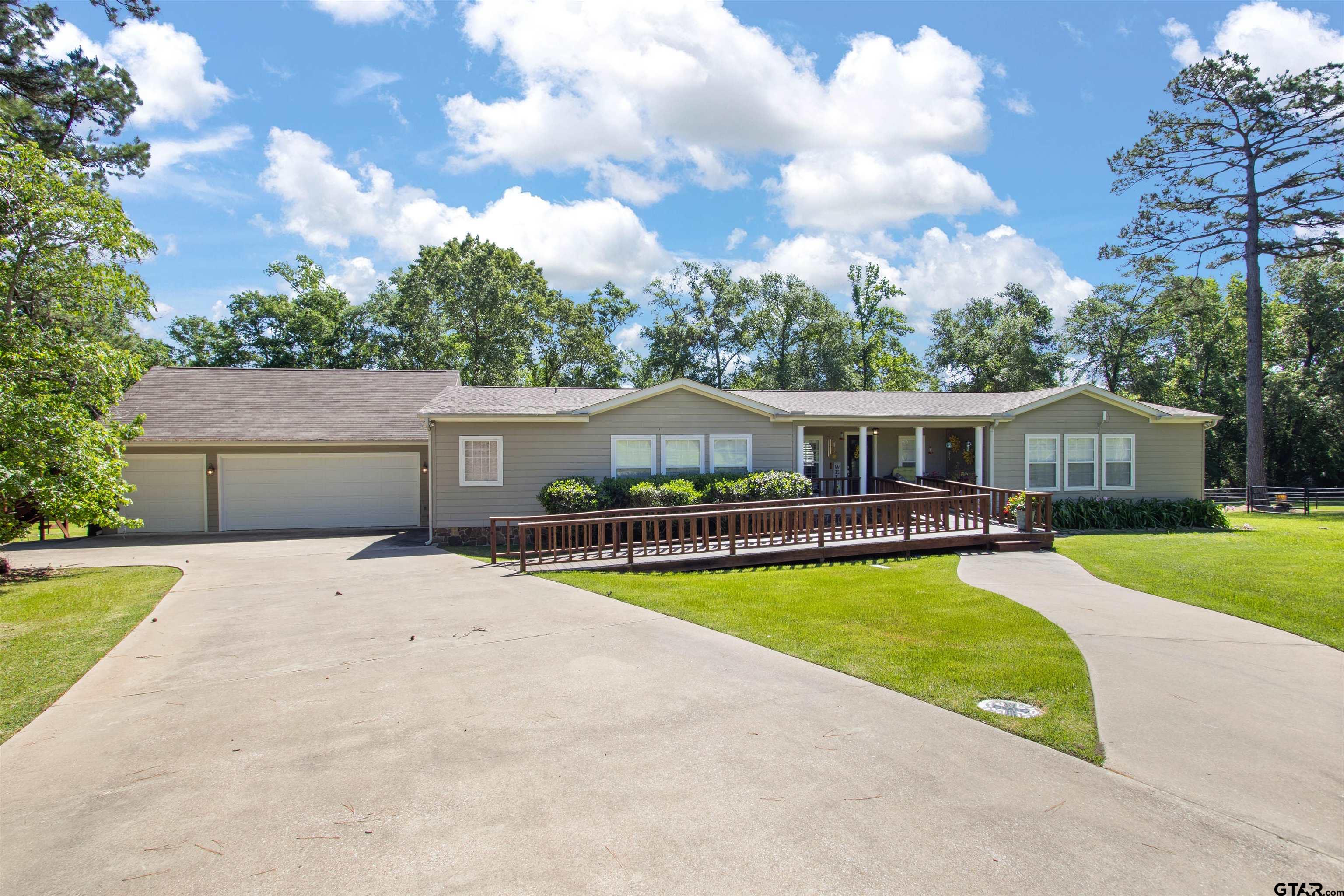 1506 Hamby Road Longview, TX 75605 - Photo 39 of 48 a view of a house with swimming pool and a yard