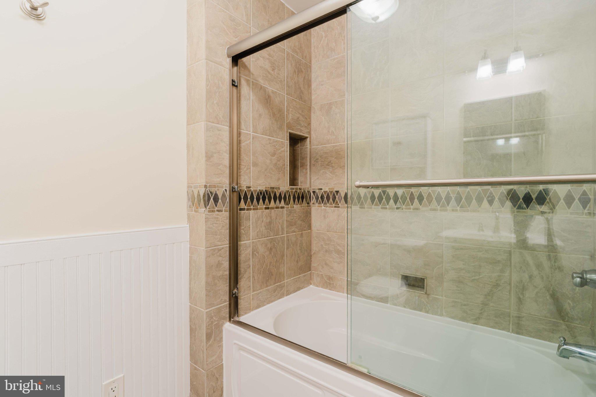 10200 Duvawn Place Silver Spring, MD 20902 - Photo 20 of 42 Elegant bath with modern finishes.