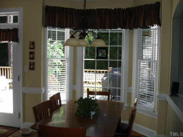 2708 Amstel Way Raleigh, NC 27613 - Photo 3 of 10 a living room with furniture and a window