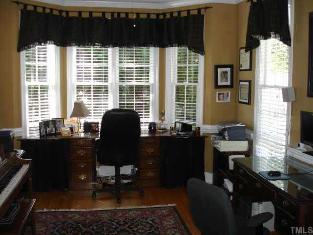 2708 Amstel Way Raleigh, NC 27613 - Photo 7 of 10 a view of a workspace with furniture