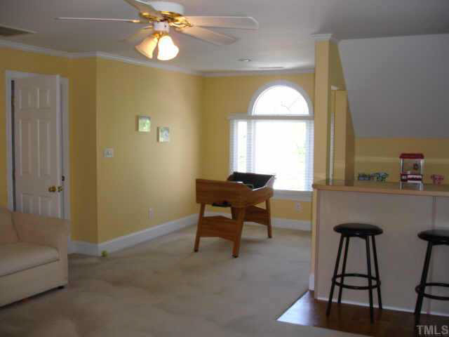2708 Amstel Way Raleigh, NC 27613 - Photo 9 of 10 a workspace with furniture window and wooden floor