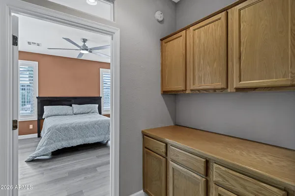 a view of bedroom with furniture and staircase
