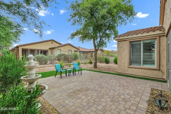 a view of house with a outdoor space and sitting area