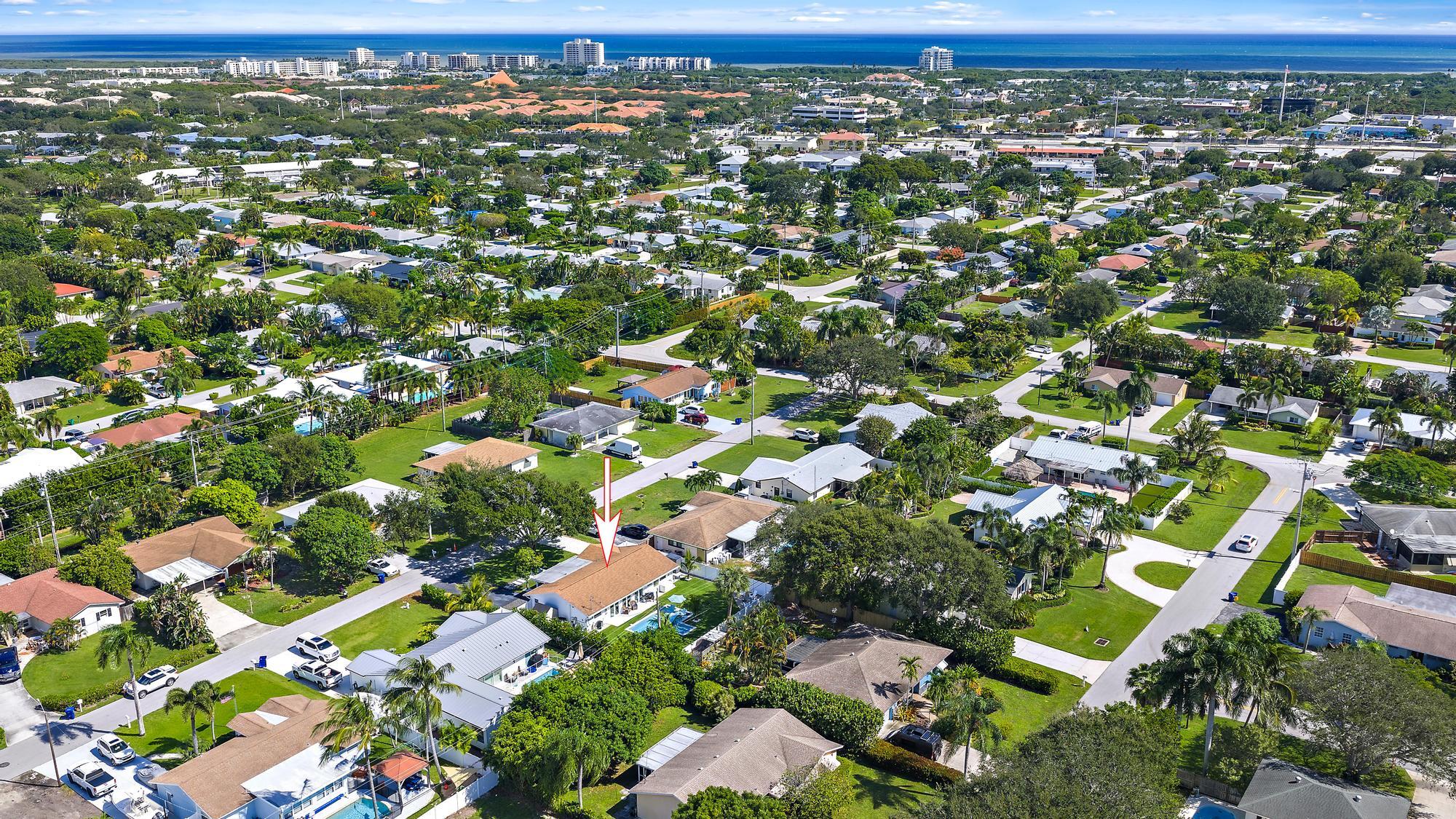 8 Windsor Road West Jupiter, FL 33469 - Photo 26 of 32 an aerial view of residential houses with outdoor space