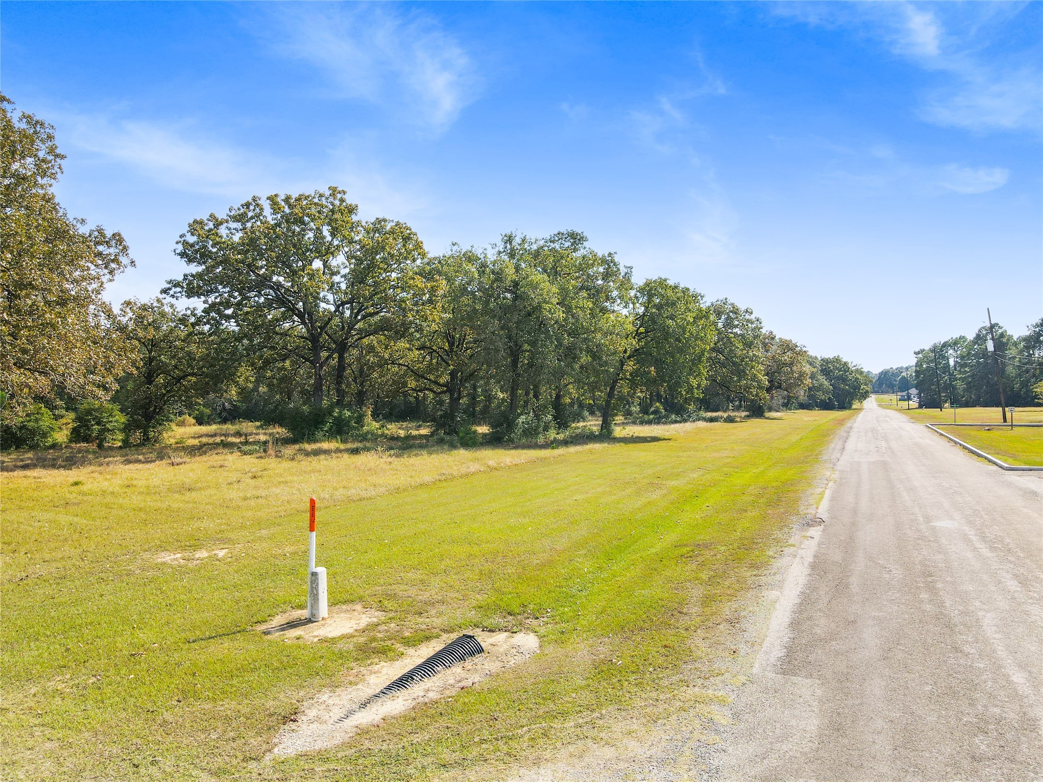 Lot 10 Lake Livingston Lane Trinity, TX 75862 - Photo 10 of 11 a view of a swimming pool with an outdoor space and seating area