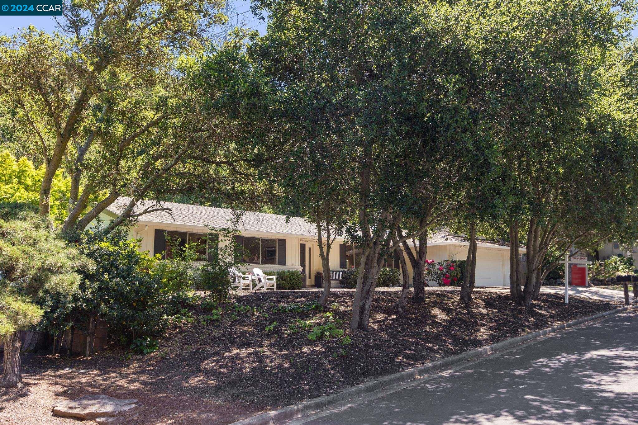516 Silverado Drive Lafayette, CA 94549 - Photo 1 of 1 a view of a house with a tree beside it