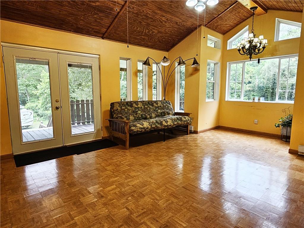 615 Fallen Timbers Road Point Marion, PA 15474 - Photo 15 of 44 a spacious bedroom with a large bed and a large window