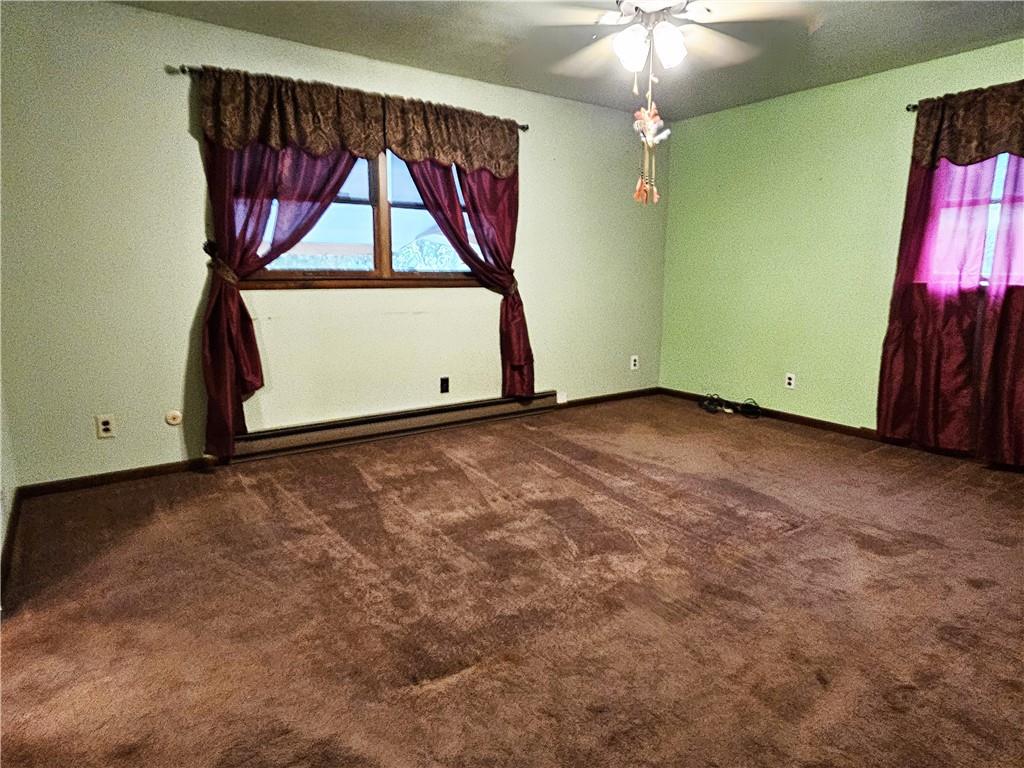 615 Fallen Timbers Road Point Marion, PA 15474 - Photo 19 of 44 an empty room with window and a chandelier fan