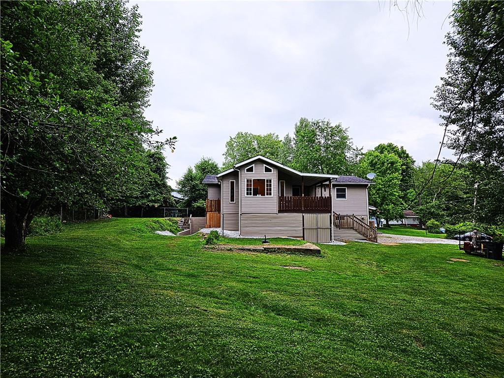 615 Fallen Timbers Road Point Marion, PA 15474 - Photo 42 of 44 a house view with a sitting space and garden