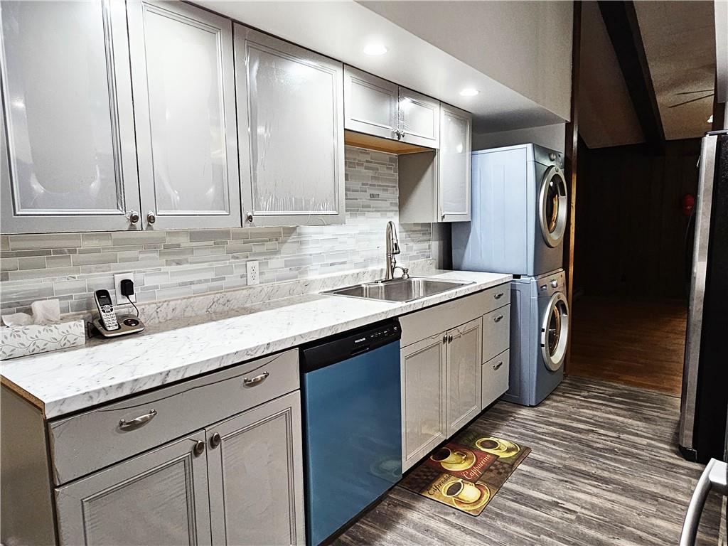 615 Fallen Timbers Road Point Marion, PA 15474 - Photo 6 of 44 a kitchen with a sink refrigerator and cabinets