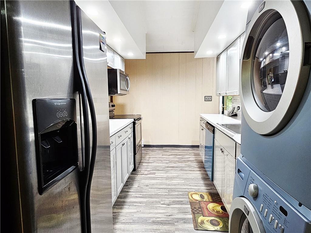 615 Fallen Timbers Road Point Marion, PA 15474 - Photo 7 of 44 a hallway with washer and dryer