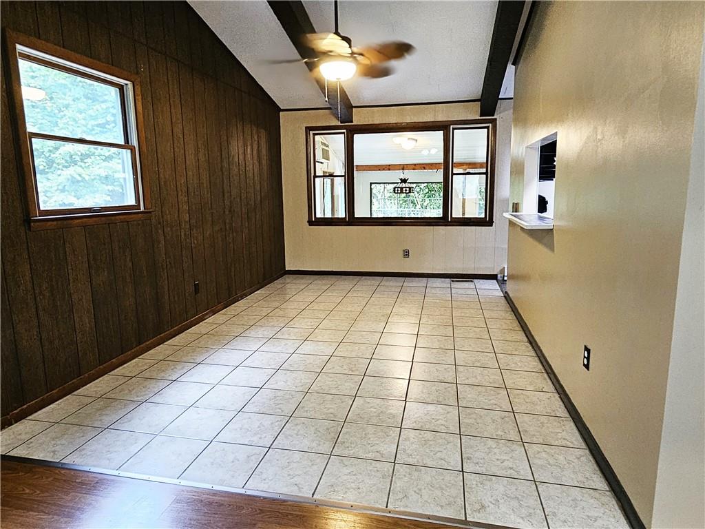 615 Fallen Timbers Road Point Marion, PA 15474 - Photo 10 of 44 en empty room with windows and fan