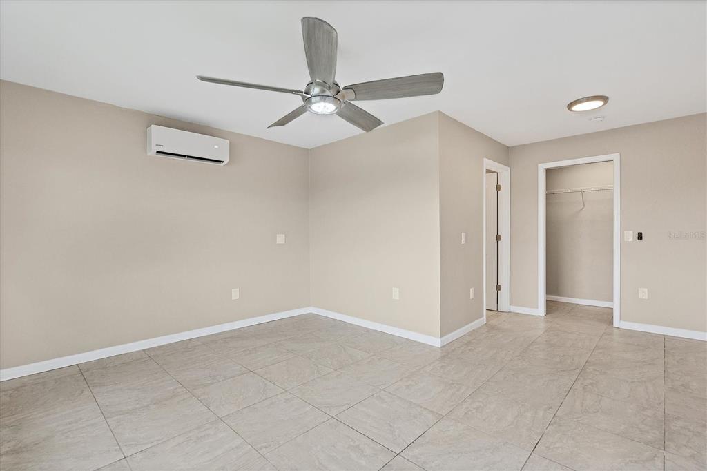 76 Caddy Road Rotonda West, FL 33947 - Photo 31 of 62 wooden floor in an empty room