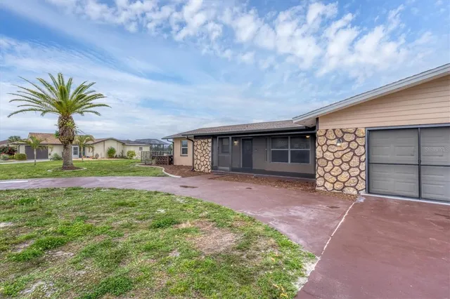 a aerial view of a house with garden