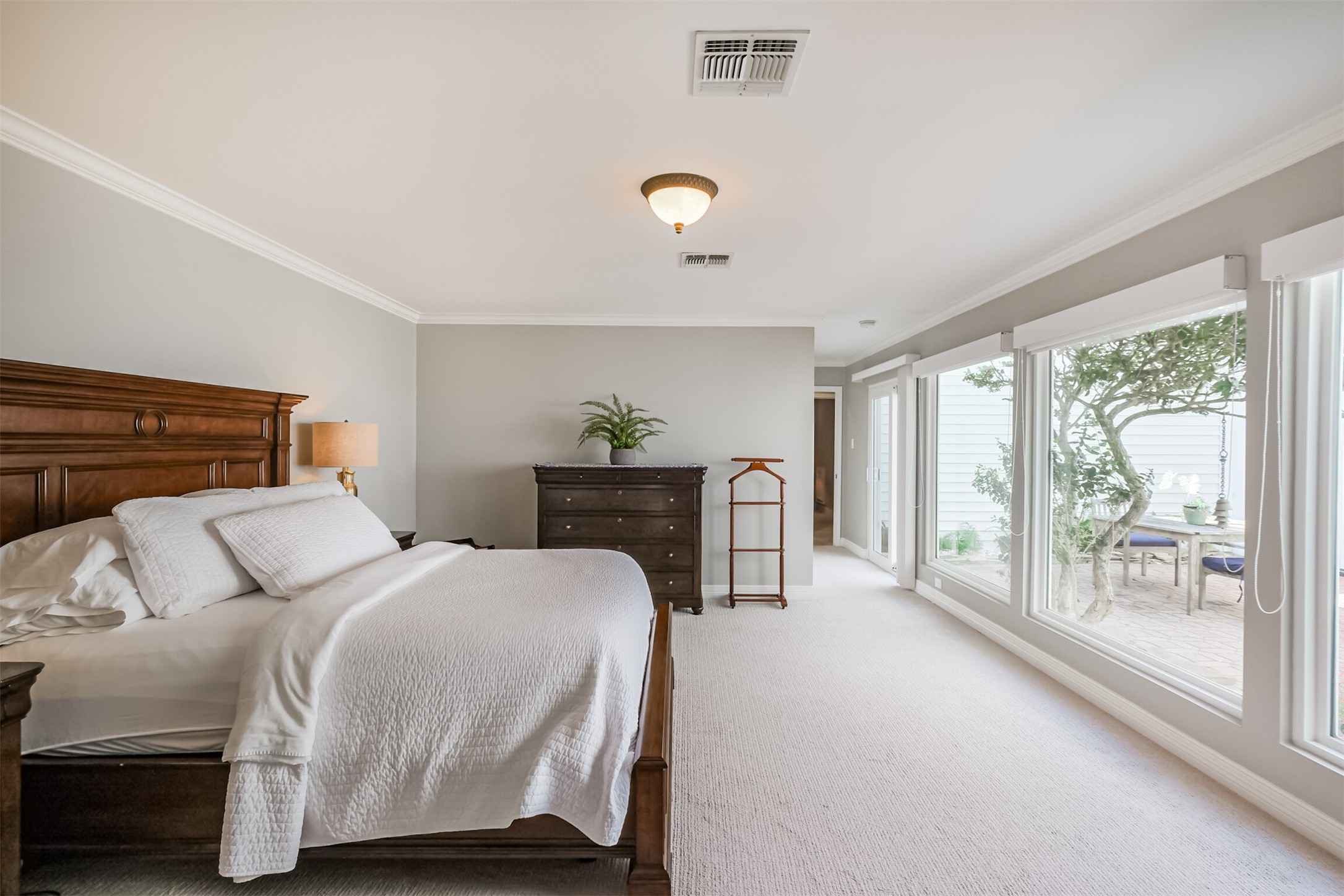 1007 Arrow Hill Road Houston, TX 77077 - Photo 24 of 48 Plenty of space throughout the primary suite for a king size bed and multiple dressers.