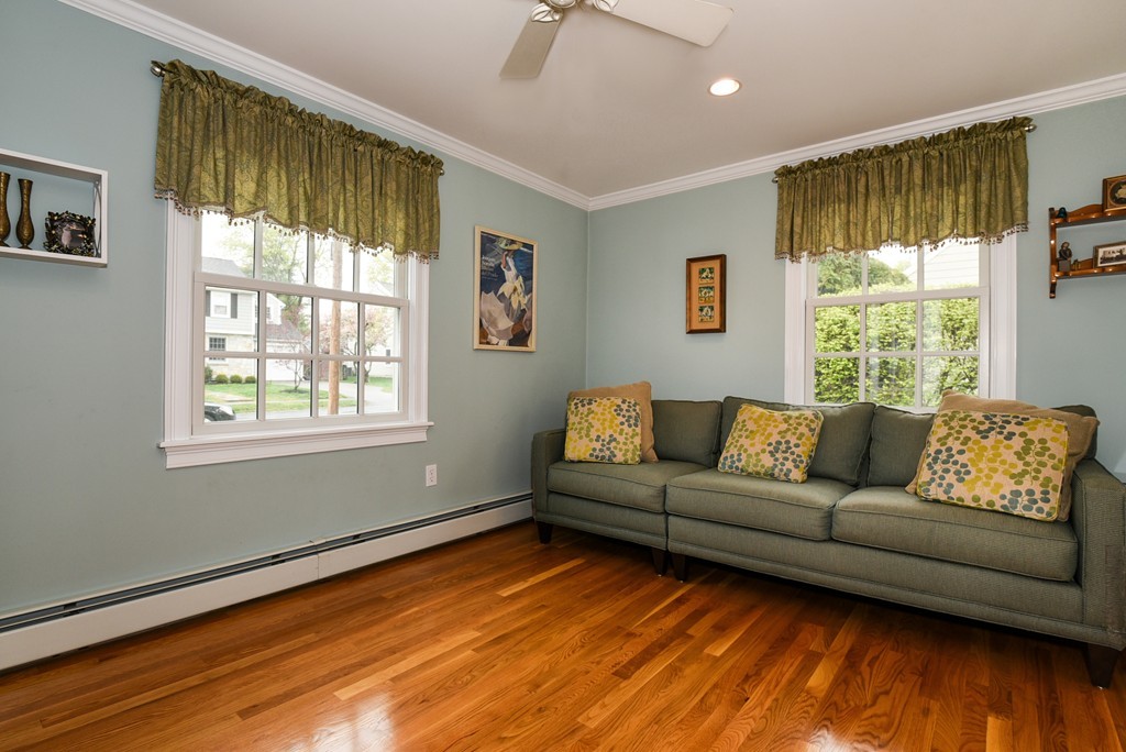 43 Douglas Road Needham, MA 02492 - Photo 11 of 23 a living room with furniture and a flat screen tv