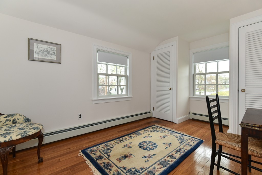 43 Douglas Road Needham, MA 02492 - Photo 20 of 23 a view of a room with furniture and wooden floor