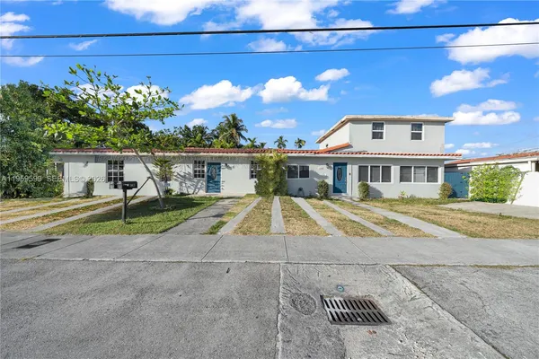 a view of house with outdoor space and street view