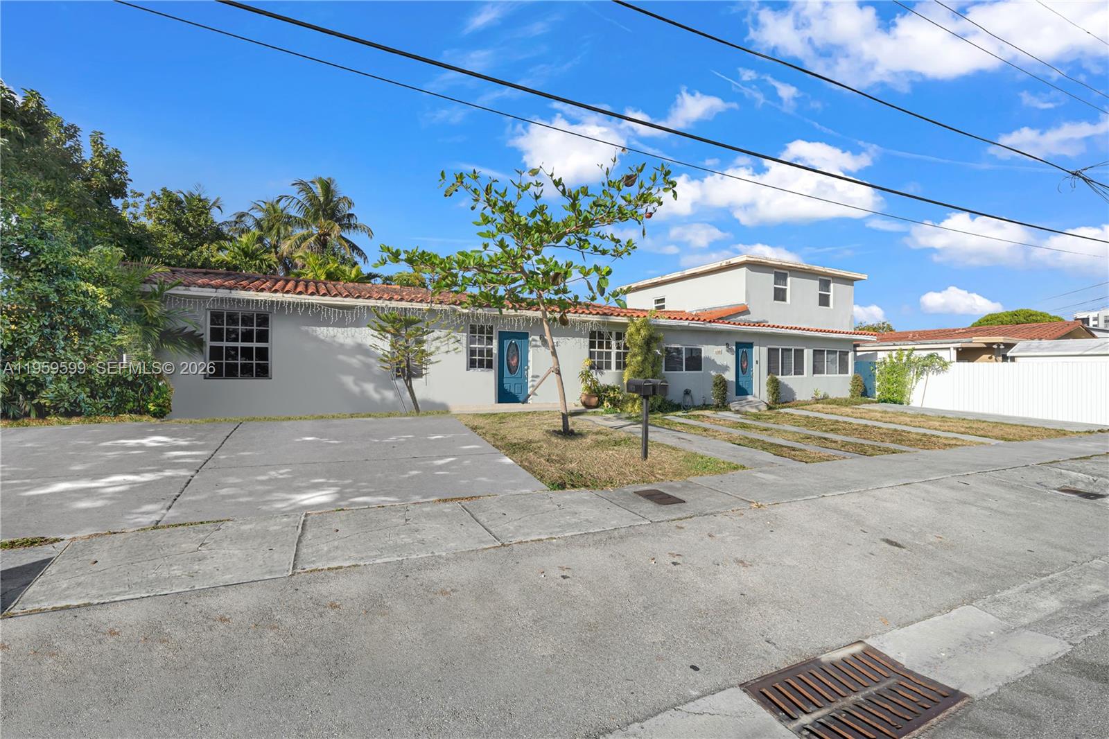 11021 Southwest 4th Street Sweetwater, FL 33174 - Photo 3 of 43 a view of a building with a outdoor space