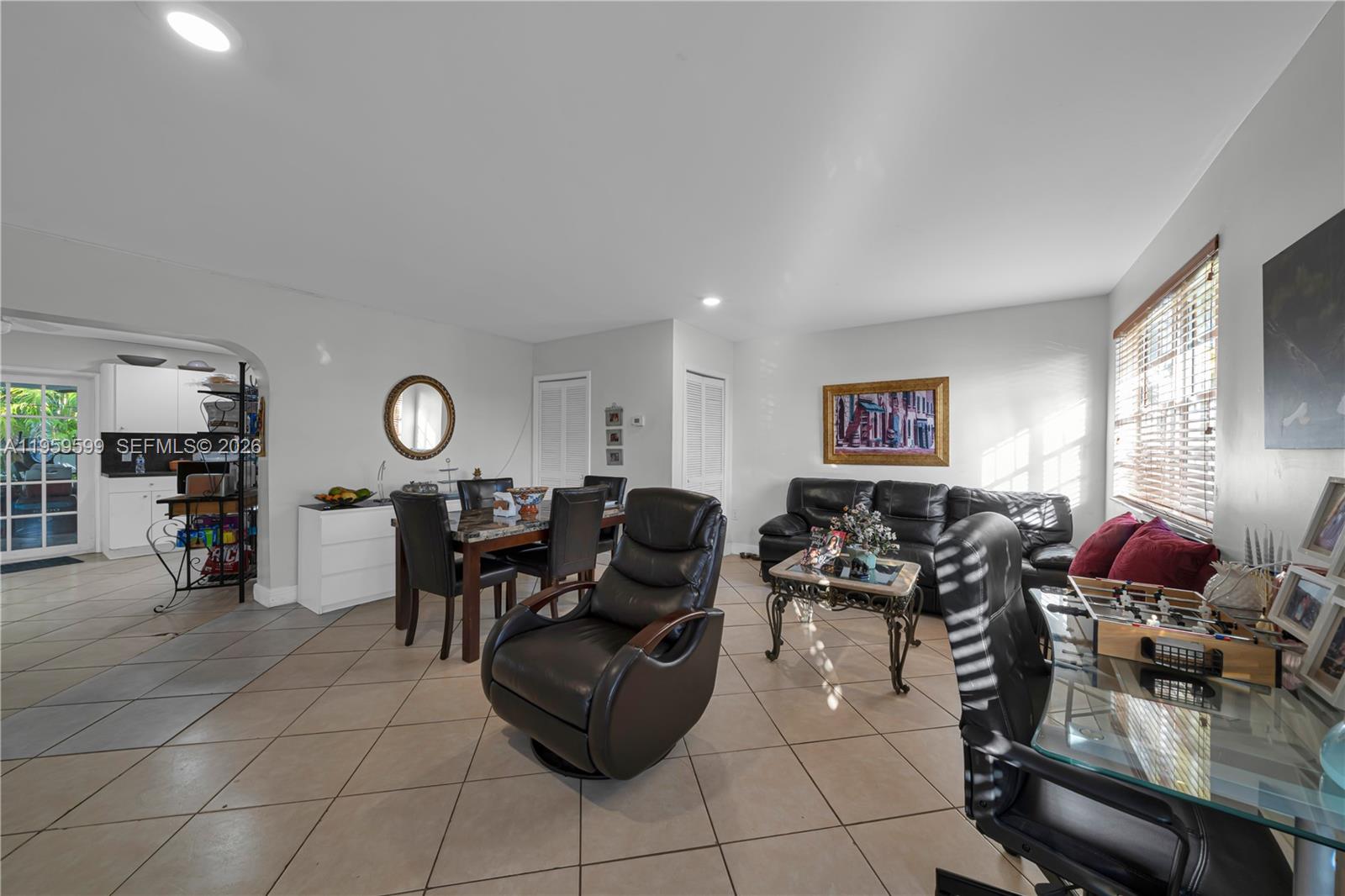 11021 Southwest 4th Street Sweetwater, FL 33174 - Photo 36 of 43 a living room with furniture and a large window