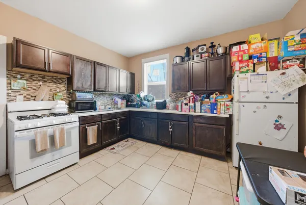 $410,000 | 7546 South Sangamon Street, Chicago, IL 60620