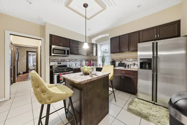 $410,000 | 7546 South Sangamon Street, Chicago, IL 60620